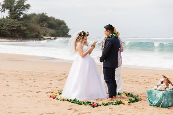 Beautiful beach Wedding at Tunnels Kauai Hawaii. Waer a Haku colorful flower crown for the ceremony or photoshoot. Listen to the crushing waves at the beach. Be careful with jumping in the ocean unexpected a big set of waves could pull you out. Give me a smile, let me be your photographer on Kauai